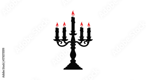 Elegant black candelabra with five lit candles a striking silhouette