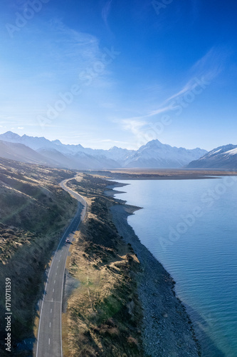 Aerial view of the highway to Mt. Cook along Lake Pukaki in South Island of New Zealand on a clear day