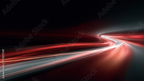 Abstract white and red light trails on a dark background, creating a sense of speed and motion in the night