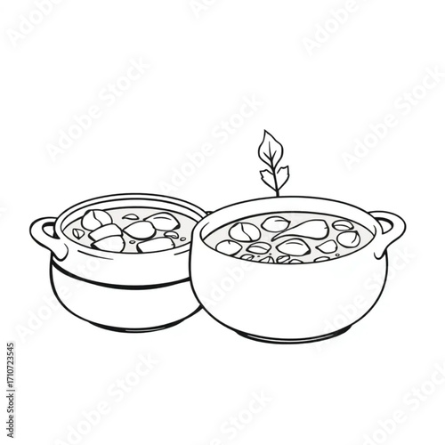 Homemade vegetable spring soup in ceramic crocks