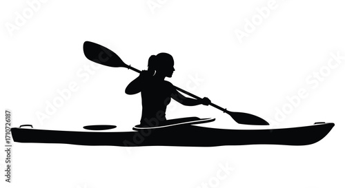 Silhouette of a kayaker paddling on calm water with a sleek boat