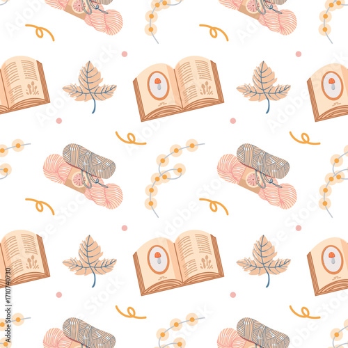 A warm, cozy autumnal seamless pattern. Garland, yarn, books, and autumn leaves on a white background. A colorful background with autumnal elements and attributes. A lovely autumnal print for textiles