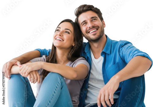 Happy couple sitting together looking upwards isolated on transparent background
