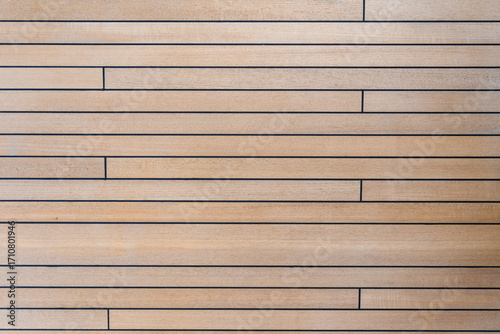 Teak wood deck texture background. Wooden deck on super yacht. Yachting concept.