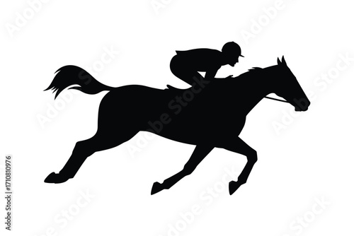 Silhouette of a jockey riding a horse at full gallop