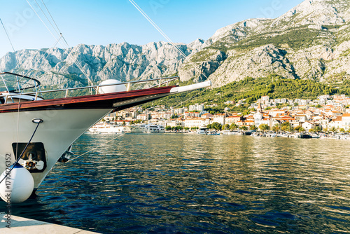 Fototapeta Naklejka Na Ścianę i Meble -  Amazing beach with boats on  azure sea in Makarska Riviera, Dalmatia region of Croatia.