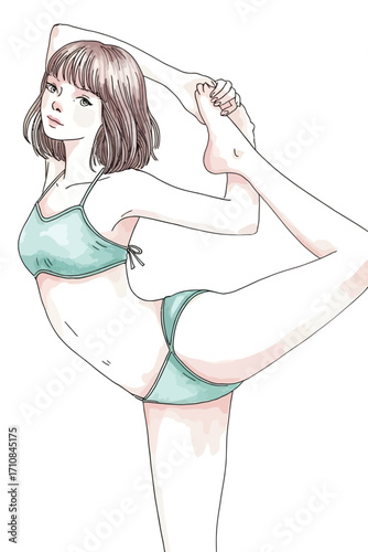 Graceful young woman in bikini performs a yoga pose with a serene expression.