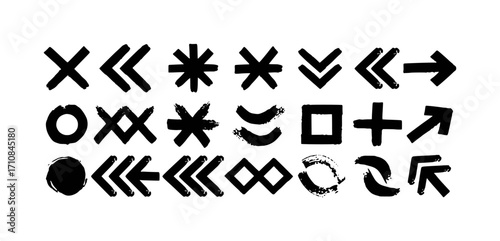 Collection of hand-drawn symbols and shapes in black ink on a white background, creating a visually diverse and artistic pattern.