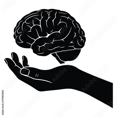Silhouette of a human brain resting gently on an open hand symbolizing intelligence and creativity