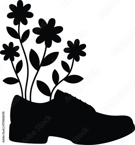 Black silhouette of a shoe with flowers growing from it silhouette