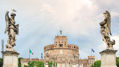 Panoramic view of Castel Sant'Angelo and the angel statues on Ponte Sant'Angelo bridge in Rome, Italy. A famous historic landmark and ancient Roman mausoleum, a top tourism destination