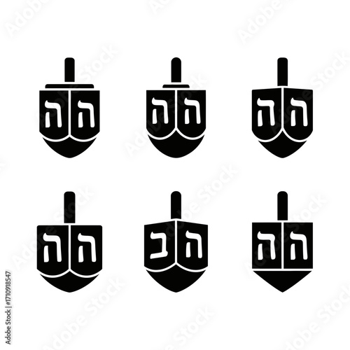 Vector art of collection of dreidels, traditional spinning tops used during the jewish holiday of hanukkah, each side featuring a hebrew letter