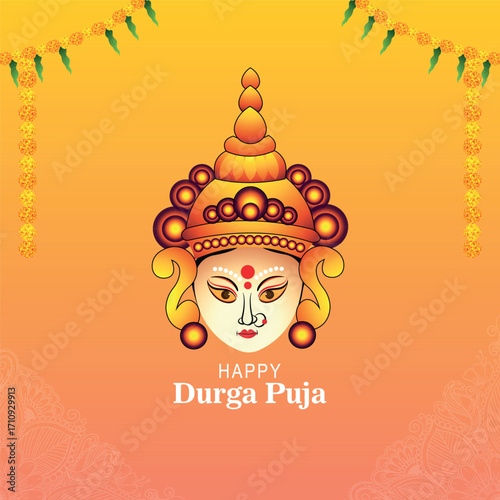 An intricate and detailed illustration of the serene face of Goddess Durga with ornate headgear, celebrating the Hindu festival of Durga Puja against a vibrant orange and yellow background.