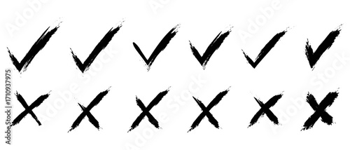 Dirty grunge hand drawn brush stroke set with cross X and tick V check marks. Rough vector symbols for YES and NO, voting boxes, web buttons, validation, approval or rejection icons.