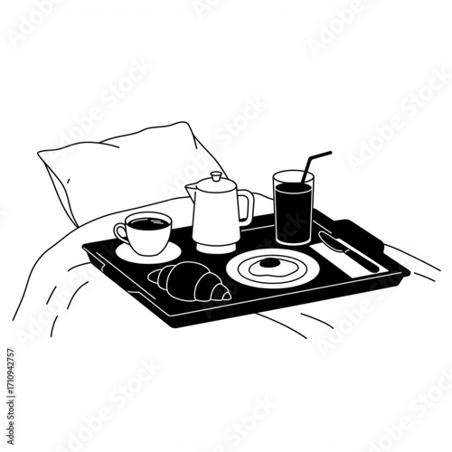 Room service breakfast on tray with coffee and croissant in bed  