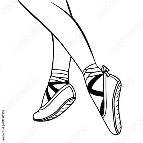 Elegant ballet dancer s feet in pointe shoes