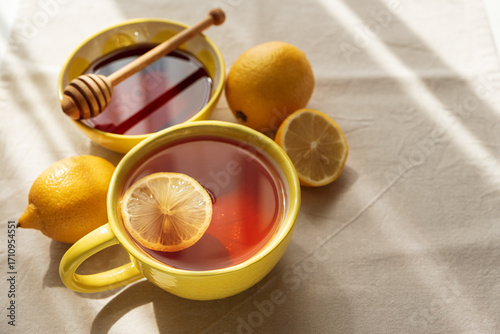Flat Lay with Lemon Tea and Honey on Light Table under Sun Light