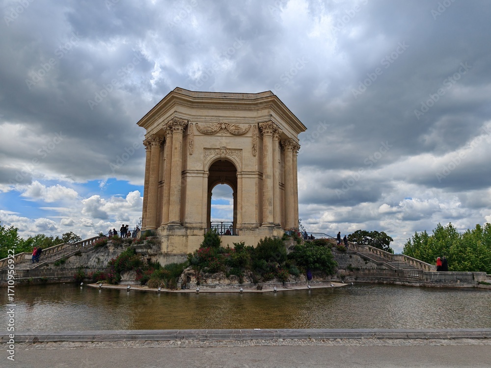 Fototapeta premium Historic stone monument with arch and fountain
