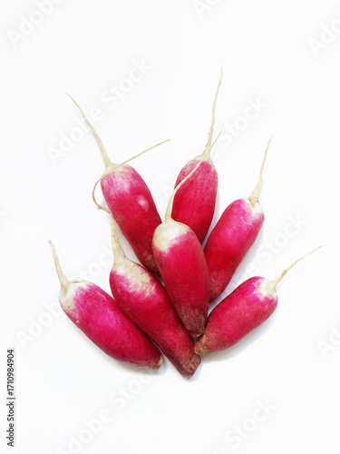 elongated radishes on a white background