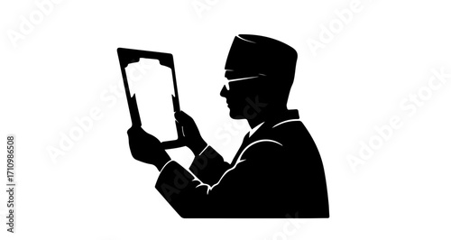 Professional doctor meticulously examines patient's X-ray scan showing skeletal structure for diagnosis and treatment planning in modern clinic