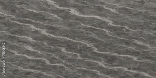 Blue ocean waves gently ripple onto the wet sandy beach creating a clear natural pattern