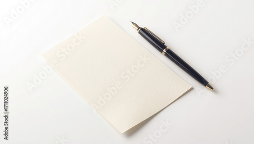 Pen and Blank Paper on a White Background