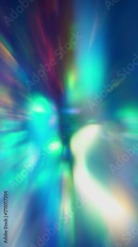 The crystal prism shimmered with a holographic shine, casting blue glare and a blurry rainbow overlay of light
