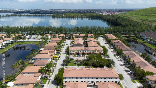 Photos Aerial photo of residential community with lakes in Doral, Florida