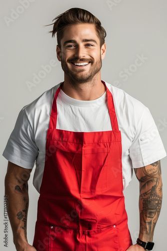 man wearing a red apron on a white background