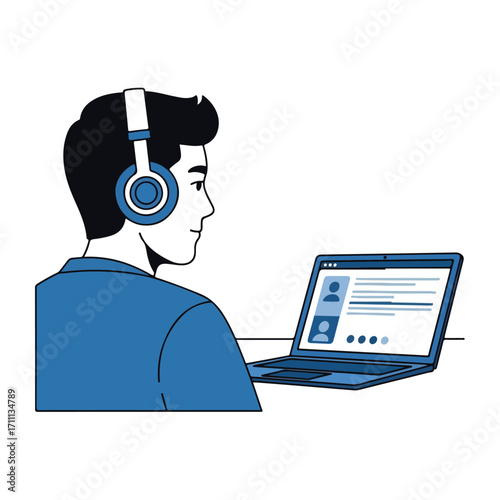 Man Wearing Headphones Looking at Laptop