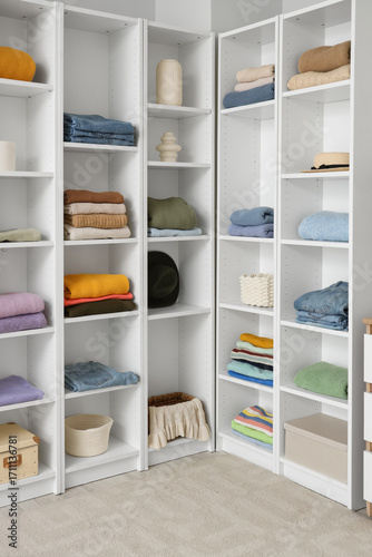 Big wardrobe with clothes i...