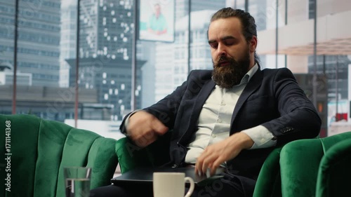 Worried hopeless businessman working under pressure in despair, struggling with corporate downfall and battling the stress of a financial crisis. Business failure and problems. Camera B.