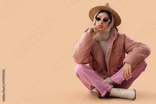 Stylish young woman in puff...