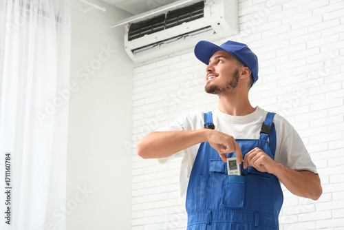 Male technician with air co...