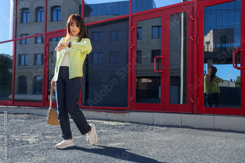 Young Asian woman looking a...