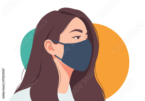 Portrait of a young woman wearing a dark blue face mask and looking to the side.