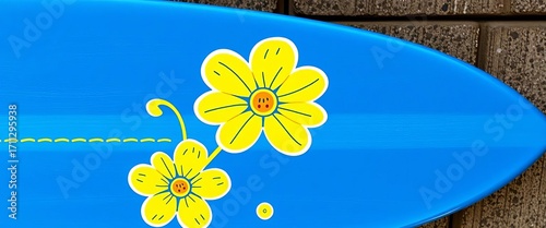 Whimsical navy blue surfboard sticker with a cheerful yellow flower design,  fun,  whimsical