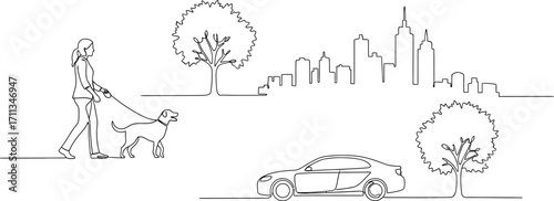 Woman walking dog in park with city skyline and car in background