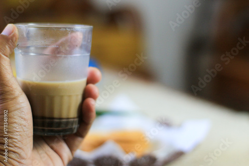 Breakfast and snack menu. Butter biscuits with pineapple jam and a glass of chocolate milk. Close-up of butter cookies and a glass of chocolate, sweet cakes. Perfect for recipes, articles, catalogs.
