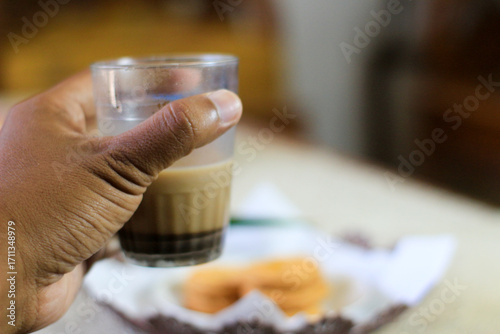 Breakfast and snack menu. Butter biscuits with pineapple jam and a glass of chocolate milk. Close-up of butter cookies and a glass of chocolate, sweet cakes. Perfect for recipes, articles, catalogs.
