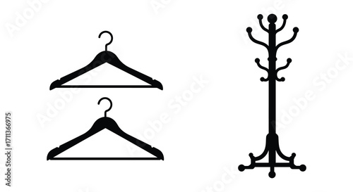 Black coat hangers and a decorative floor coat rack silhouette