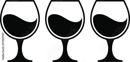 Three glasses of dark liquid arranged in a row, evoking a sense of choice or tasting.