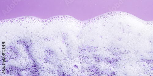 close-up, lush white detergent foam, abstract purple background, copy space,washing foam, horizontal banner for a cleaning company or laundry, poster, top view, free space for text