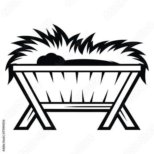 A black silhouette of a baby Jesus in a manger