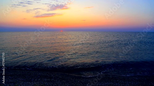 Beautiful summer sunrise over the beach