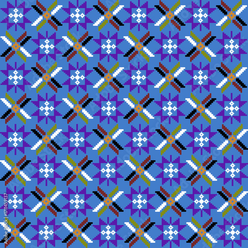 ​A detailed digital pattern featuring a repeating symmetrical design with crosses and star-like motifs. The color palette includes shades of blue, purple, black, white, gold, and green.