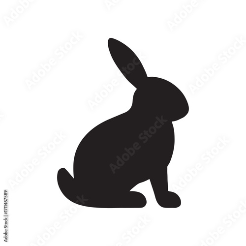 Black silhouette of a rabbit sitting isolated on white background