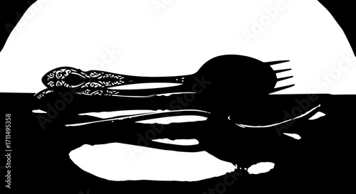 Elegant silverware set artfully arranged for a sophisticated dining experience