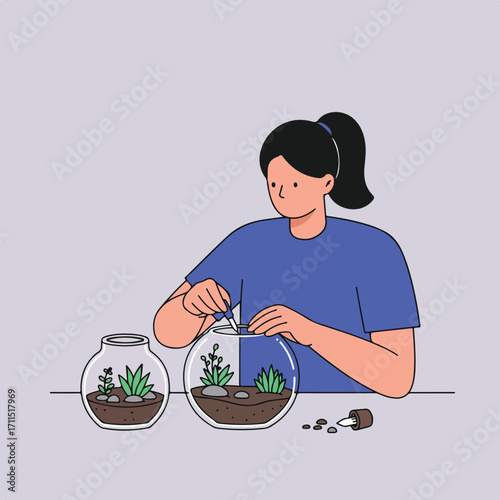 Woman arranging plants in glass terrarium on table with soil spilling around it