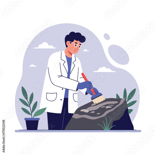 Scientist in lab coat carefully brushes dirt from rock formation on a patterned backdrop